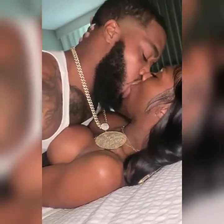 Black couple in love kissing